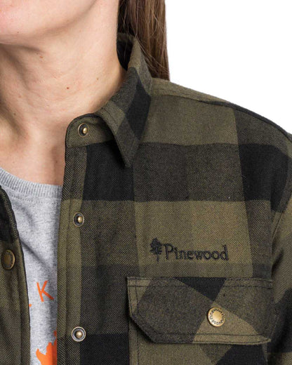 Green Black coloured Pinewood Womens Canada Classic 2.0 Shirt on white background #colour_green-black