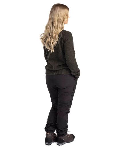 Black coloured Pinewood Womens Caribou TC Trousers on white background #colour_black