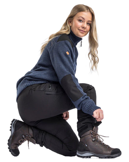 Black coloured Pinewood Womens Caribou TC Trousers on white background #colour_black