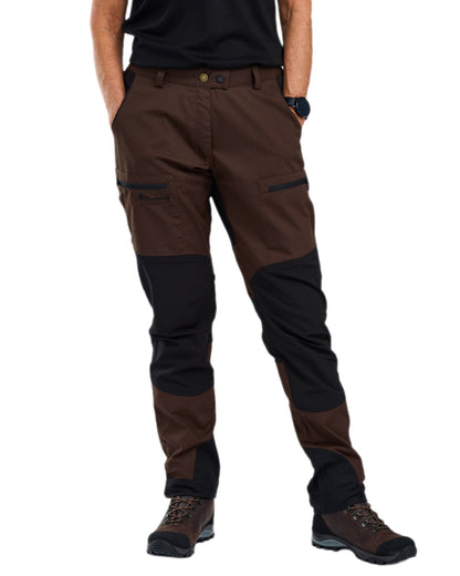Dark Brown Black Coloured Pinewood Womens Caribou TC Trousers on white background #colour_dark-brown-black