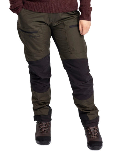 Moss Green Black coloured Pinewood Womens Caribou TC Trousers on white background #colour_moss-green-black