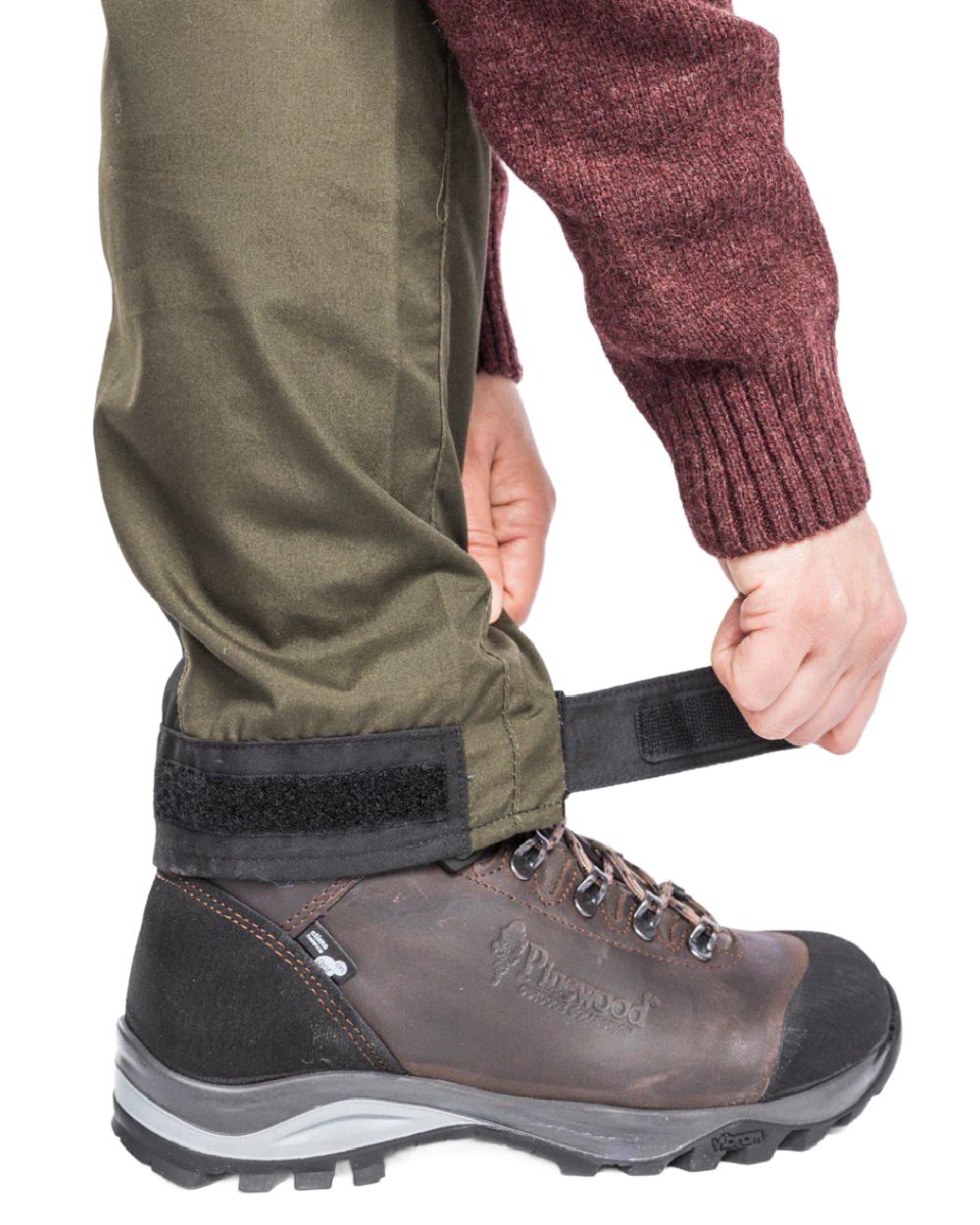 Moss Green Black coloured Pinewood Womens Caribou TC Trousers on white background #colour_moss-green-black