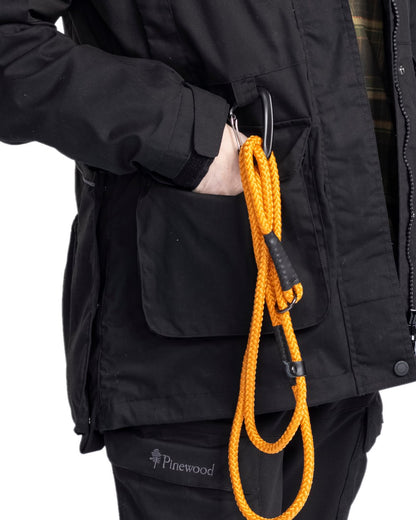Black Coloured Pinewood Womens Dog Sports Trainer Extreme Jacket on white background #colour_black