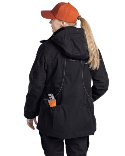 Black Coloured Pinewood Womens Dog Sports Trainer Extreme Jacket on white background #colour_black