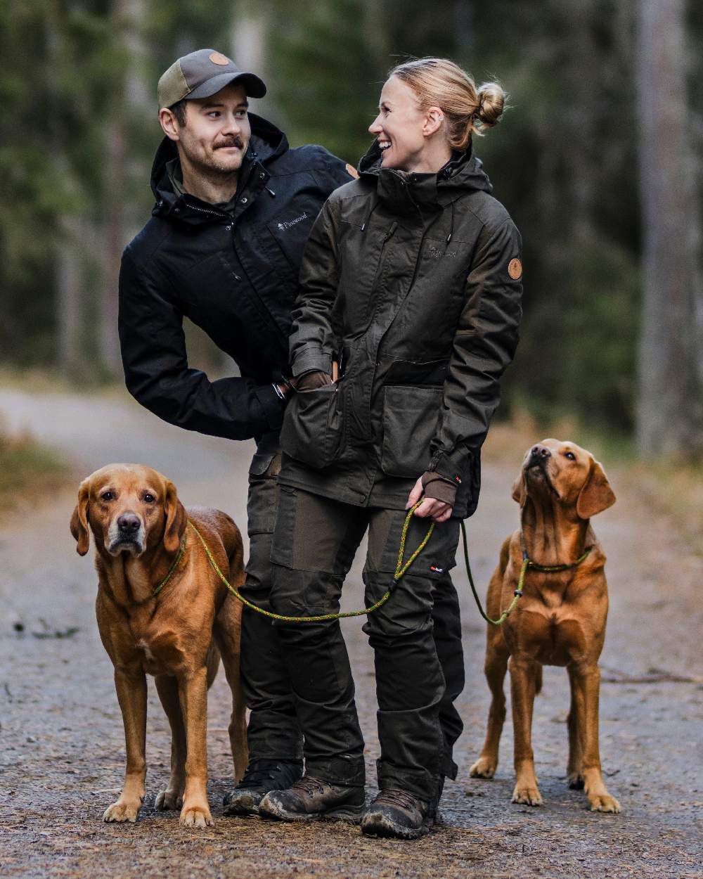 Moss Green Coloured Pinewood Womens Dog Sports Trainer Extreme Jacket on outdoor background #colour_moss-green