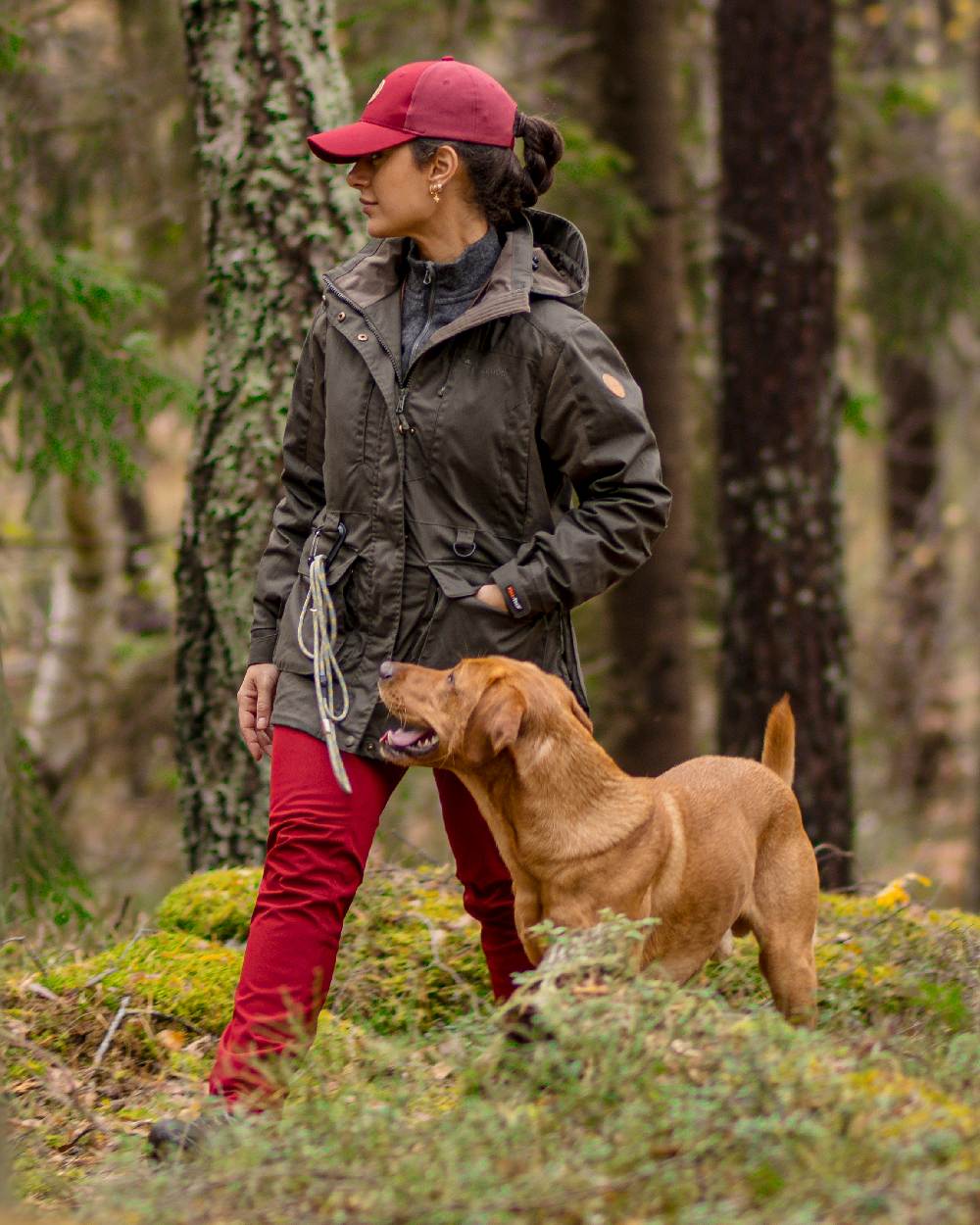 Moss Green Coloured Pinewood Womens Dog Sports Trainer Extreme Jacket on outdoor background #colour_moss-green
