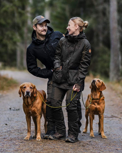 Moss Green Coloured Pinewood Womens Dog Sports Trainer Extreme Trousers on outdoor background #colour_moss-green
