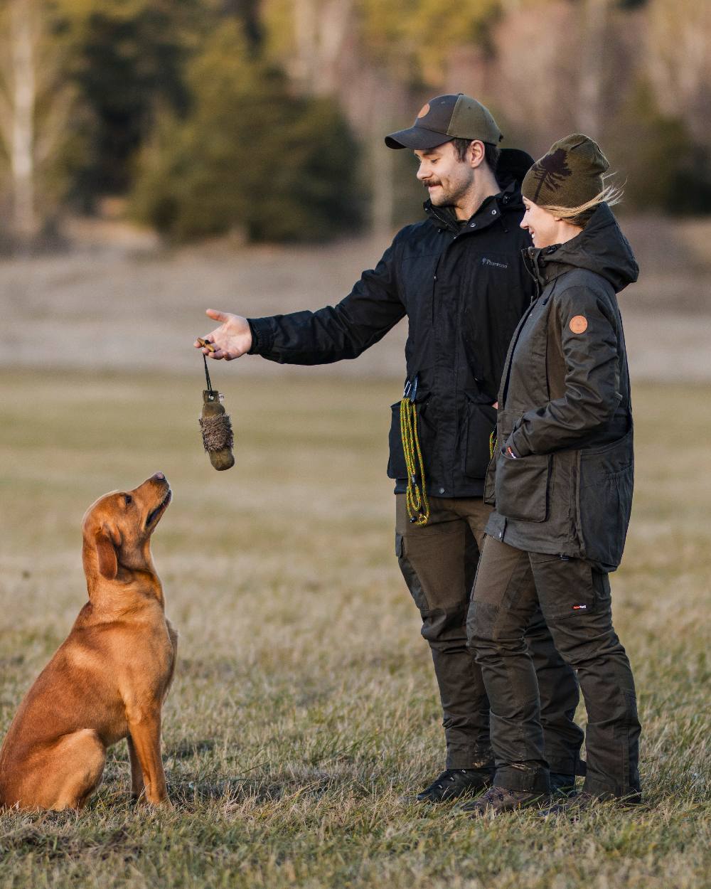 Moss Green Coloured Pinewood Womens Dog Sports Trainer Extreme Trousers on outdoor background #colour_moss-green