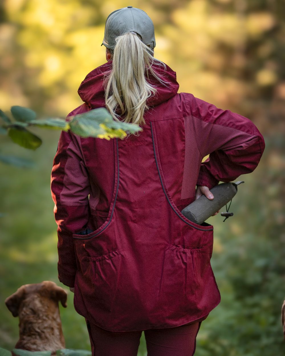 Dark Tomato Dark Red Coloured Pinewood Womens Dog Sports Trainer Jacket on outdoor background #colour_dark-tomato-dark-red