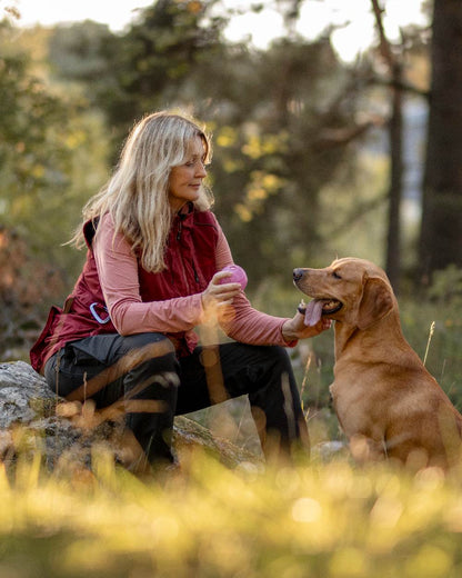 Black Coloured Pinewood Womens Dog Sports Trainer Trousers on outdoor background #colour_black