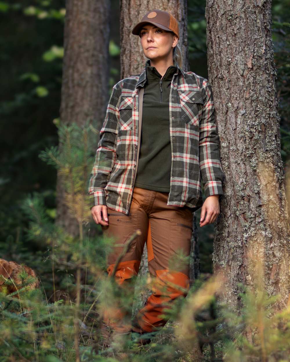 Dark Green Red coloured Pinewood Womens Douglas Shirt on forest background #colour_dark-green-red