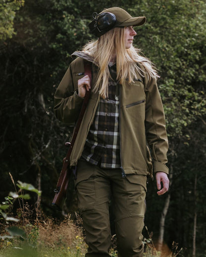Olive Green Cream White coloured Pinewood Womens Douglas Shirt on forest background #colour_olive-green-cream-white