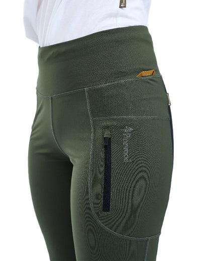 Moss Green Coloured Pinewood Womens Finnveden Active Tights 2.0 on white background #colour_moss-green