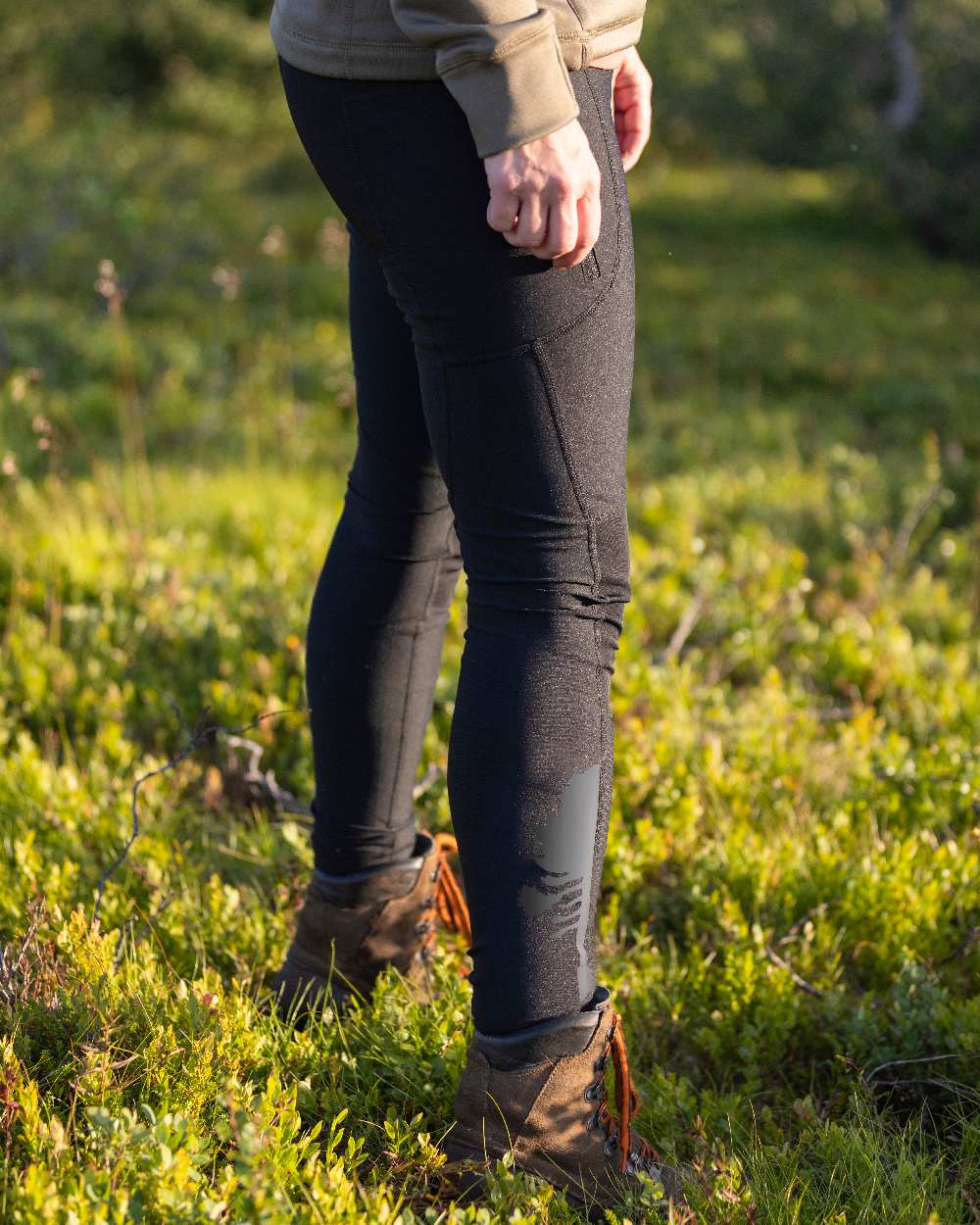 Black Coloured Pinewood Womens Finnveden Active Tights on outdoor background #colour_black