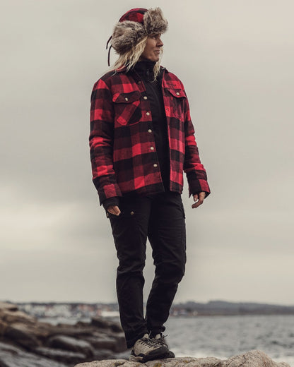 Black Coloured Pinewood Womens Finnveden Classic Trousers on outdoor background #colour_black
