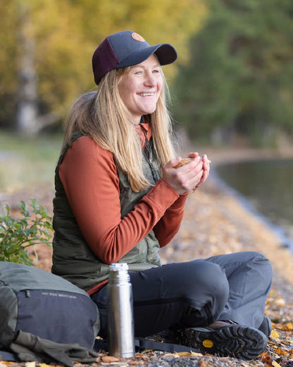 Terracotta coloured Pinewood Womens Finnveden Hoodie on lake background #colour_terracotta