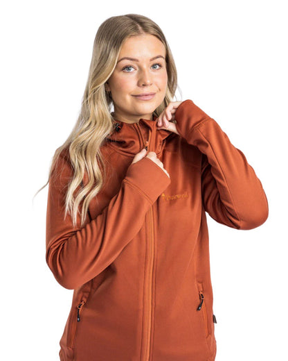 Terracotta coloured Pinewood Womens Finnveden Hoodie on white background #colour_terracotta
