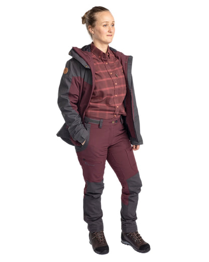 EarthPlum Dark Anthracite Coloured Pinewood Womens Finnveden Hybrid Extreme Jacket on white background #colour_earth-plum-dark-anthracite