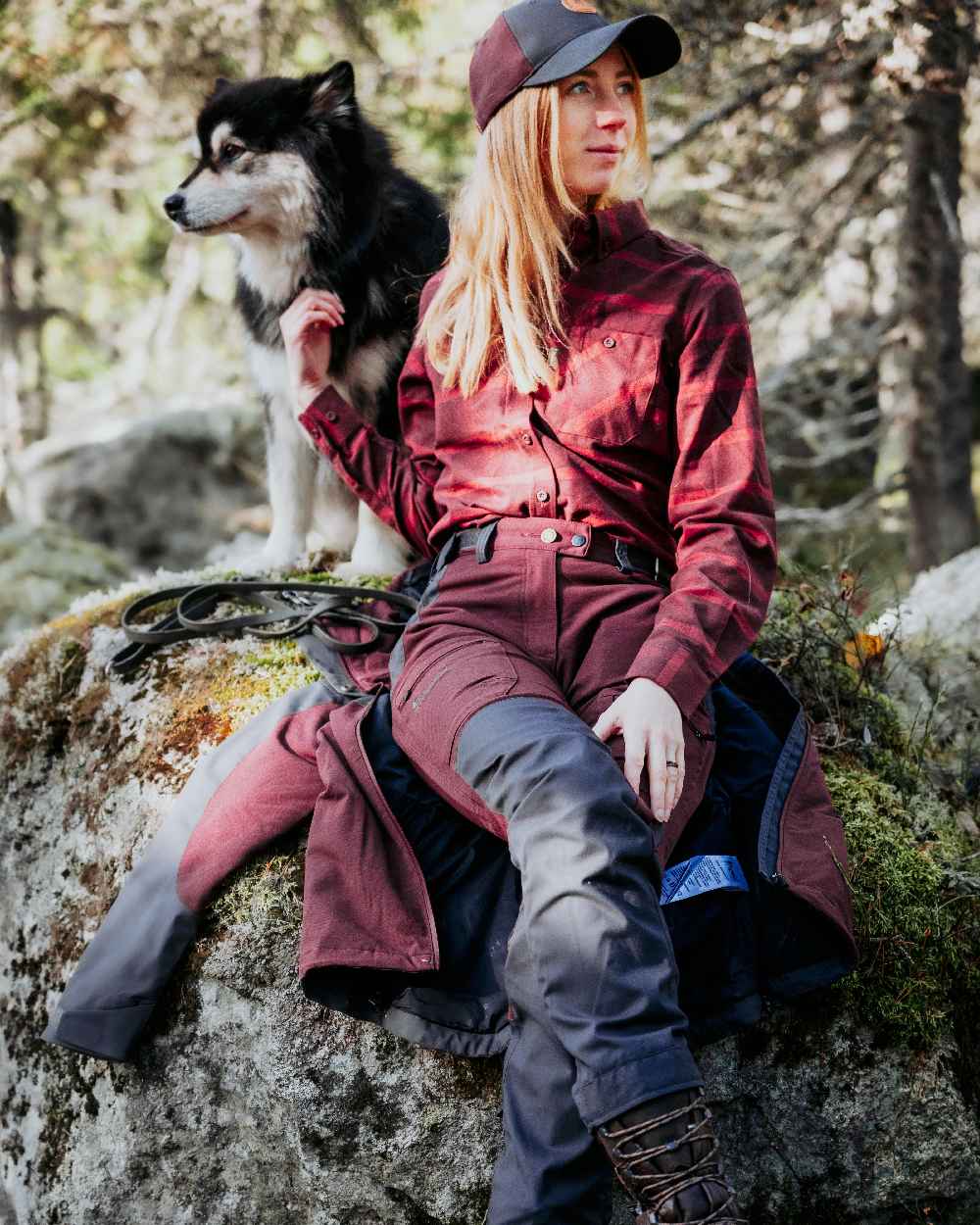 EarthPlum Dark Anthracite Coloured Pinewood Womens Finnveden Hybrid Extreme Jacket on forest background #colour_earth-plum-dark-anthracite