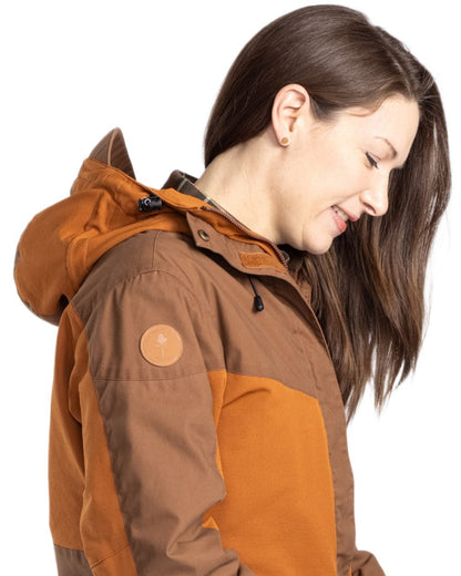 Fudge Nougat Coloured Pinewood Womens Finnveden Hybrid Extreme Jacket on white background #colour_fudge-nougat