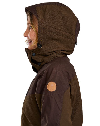 Dark Brown Coloured Pinewood Womens Finnveden Hybrid Jacket on white background #colour_dark-brown