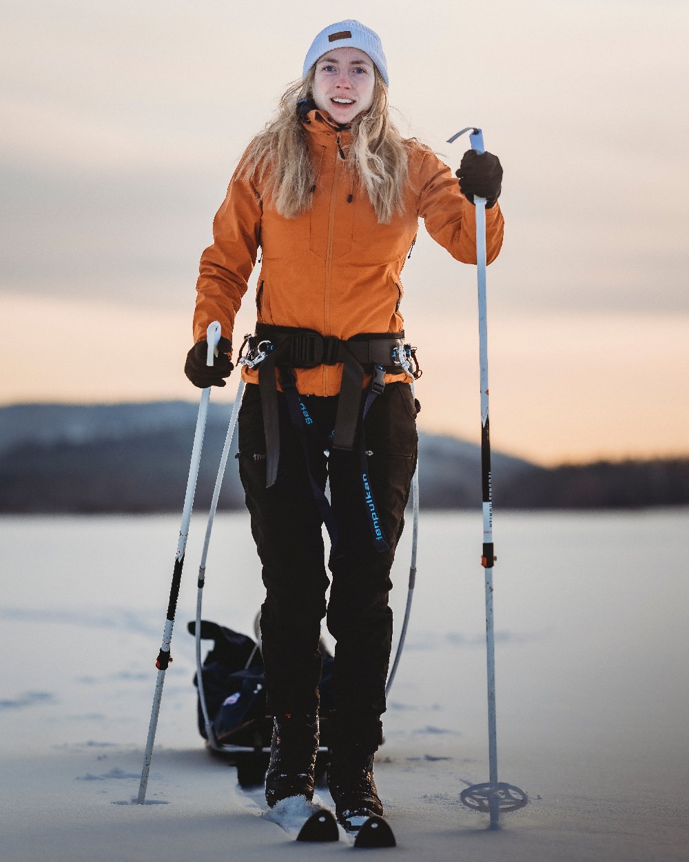 Black Coloured Pinewood Womens Finnveden Hybrid Trousers on outdoor background #colour_black