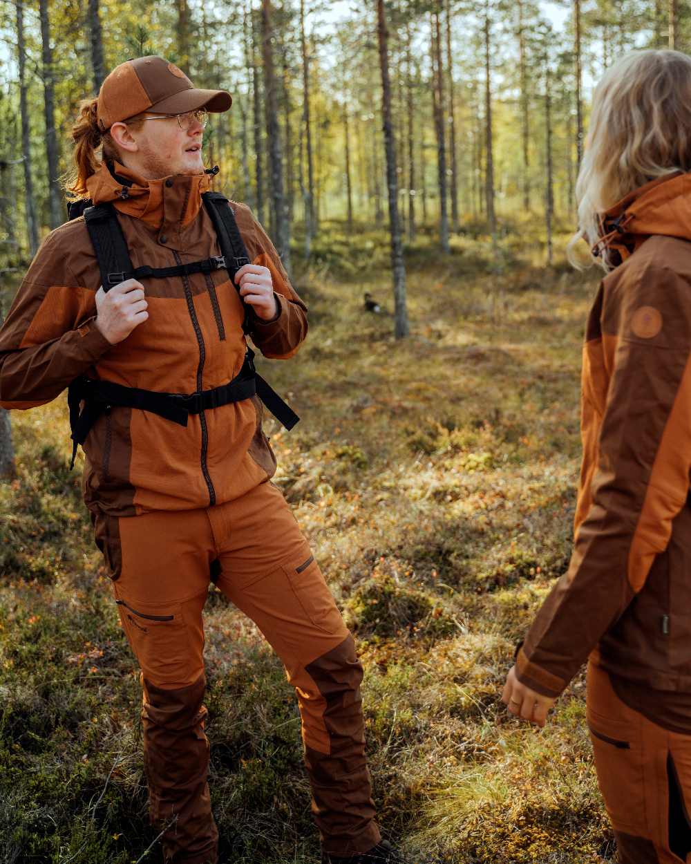 Fudge Nougat Coloured Pinewood Womens Finnveden Hybrid Trousers on outdoor background #colour_fudge-nougat