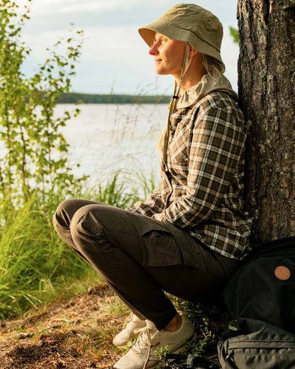 Dark Olive Coloured Pinewood Womens Finnveden Outdoor Trousers on outdoor background #colour_dark-olive