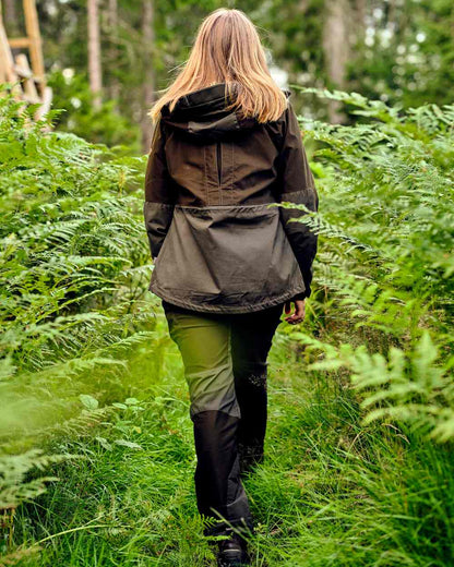 Mossgreen Dark Mossgreen Pinewood Womens Furudal Tracking Trousers on forest background #colour_mossgreen-dark-mossgreen