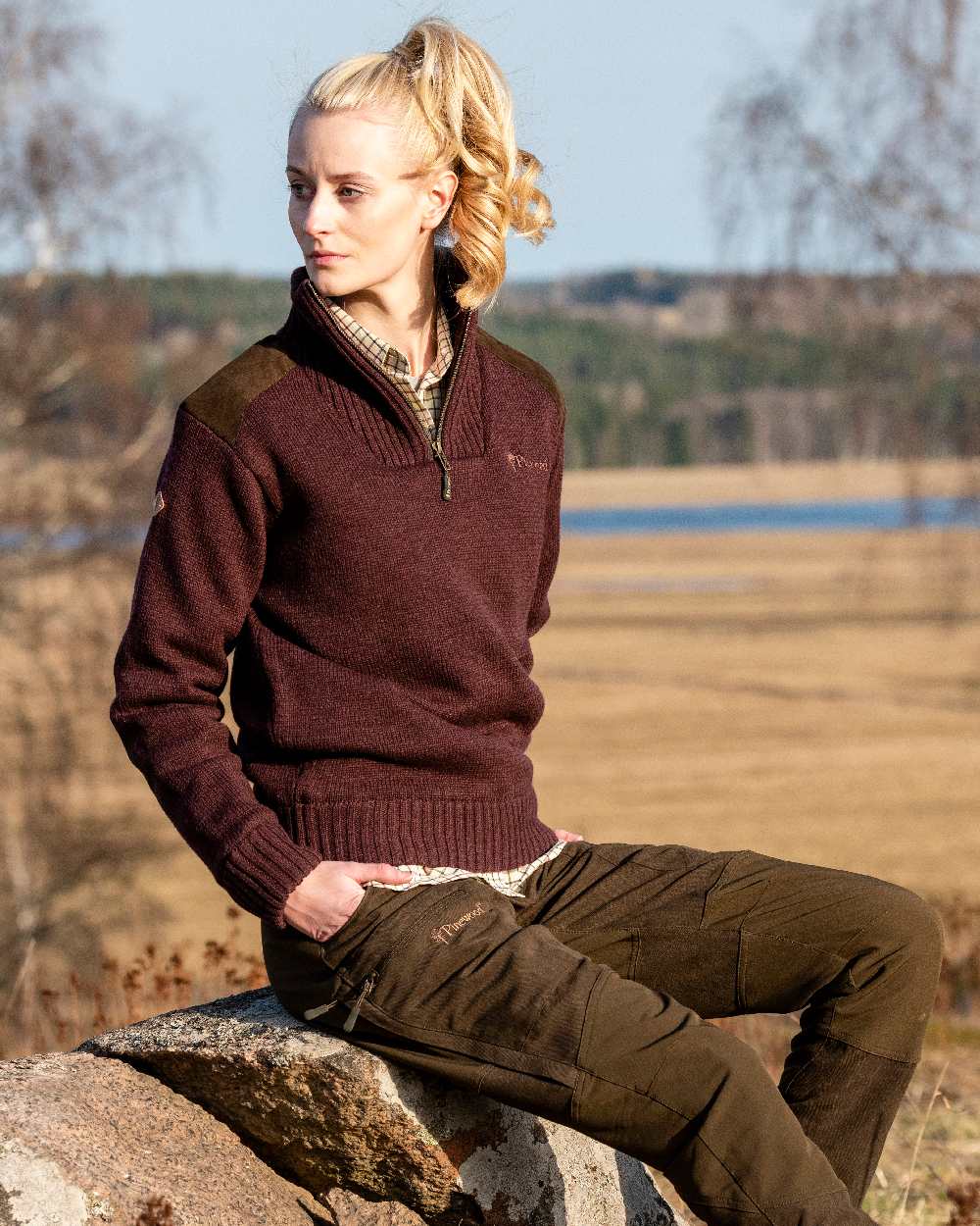 Dark Burgundy Mel Coloured Pinewood Womens Hurricane Knitted Sweater on outdoor background #colour_dark-burgundy-mel