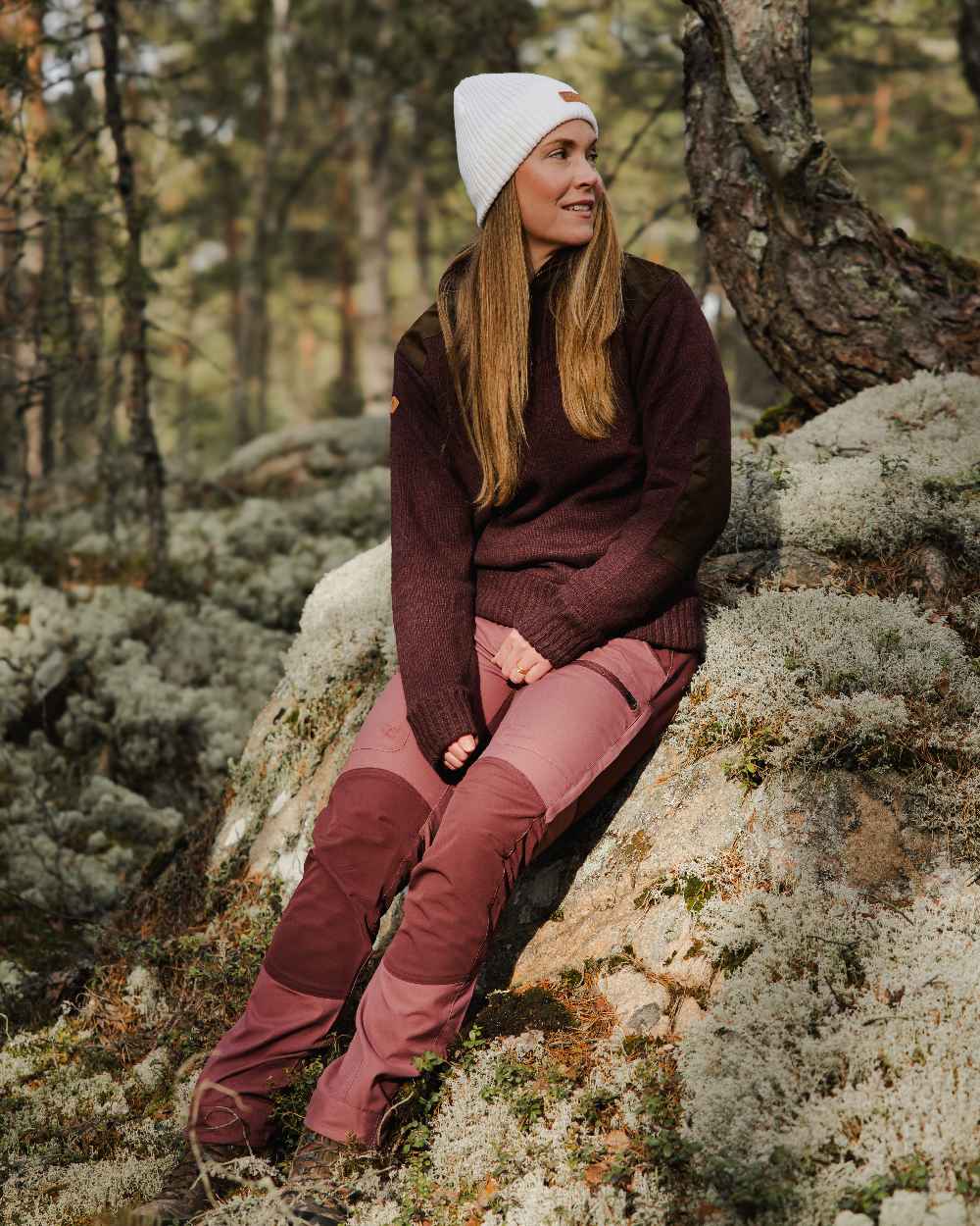 Dark Burgundy Mel Coloured Pinewood Womens Hurricane Knitted Sweater on outdoor background #colour_dark-burgundy-mel
