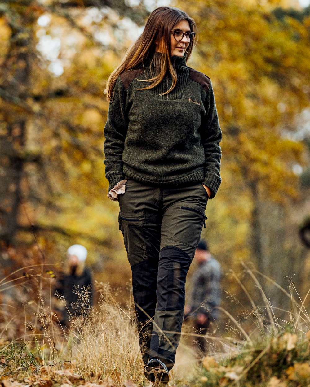 Dark Green Mel Coloured Pinewood Womens Hurricane Knitted Sweater on outdoor background #colour_dark-green-mel