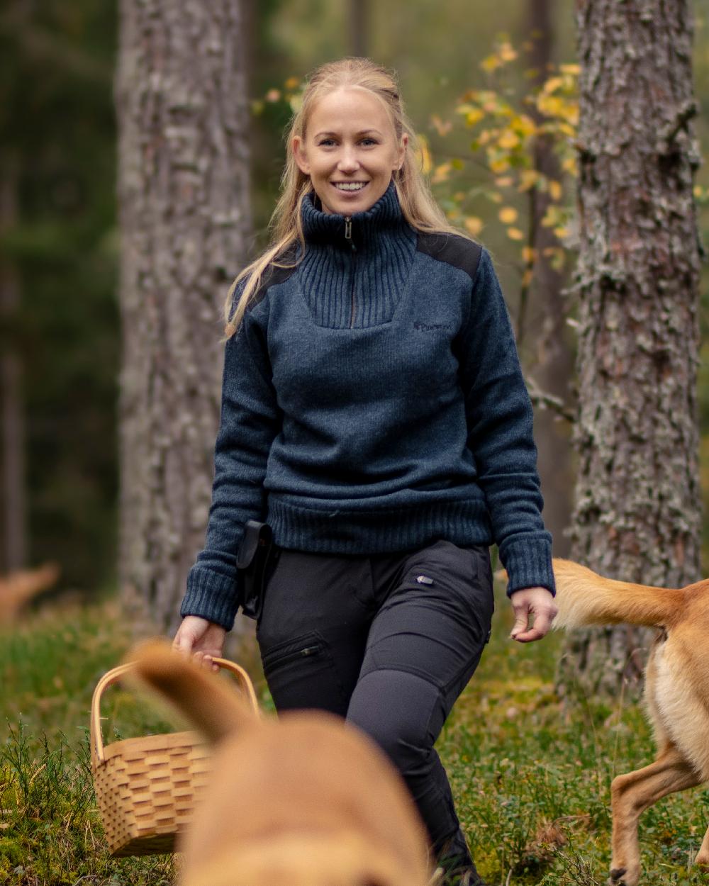 Dark Navy Mel Coloured Pinewood Womens Hurricane Knitted Sweater on outdoor background #colour_dark-navy-mel