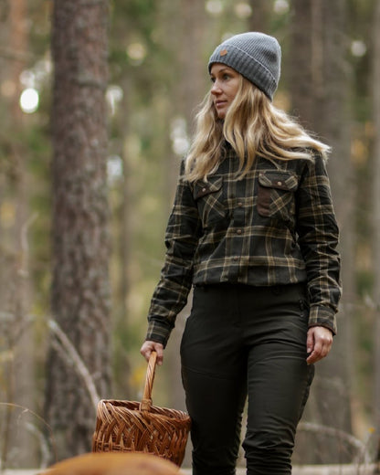 Dark Green Green Coloured Pinewood Womens Prestwick Exclusive Shirt on forest background #colour_dark-green-green