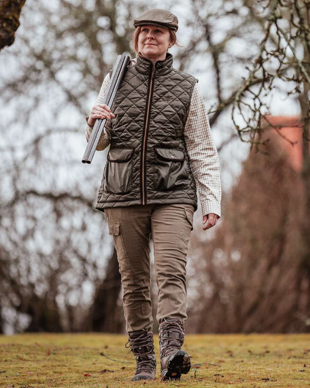 Hunting Olive Coloured Pinewood Womens Serengeti Trousers on outdoor background #colour_hunting-olive