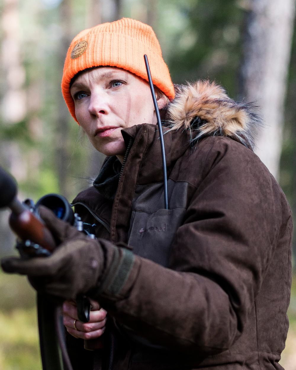 Suede Brown Coloured Pinewood Womens Smaland Abisko 2.0 Hunting Jacket on forest background #colour_suede-brown