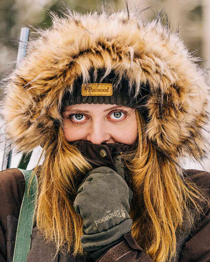 Suede Brown Coloured Pinewood Womens Smaland Abisko 2.0 Hunting Jacket on snow background #colour_suede-brown