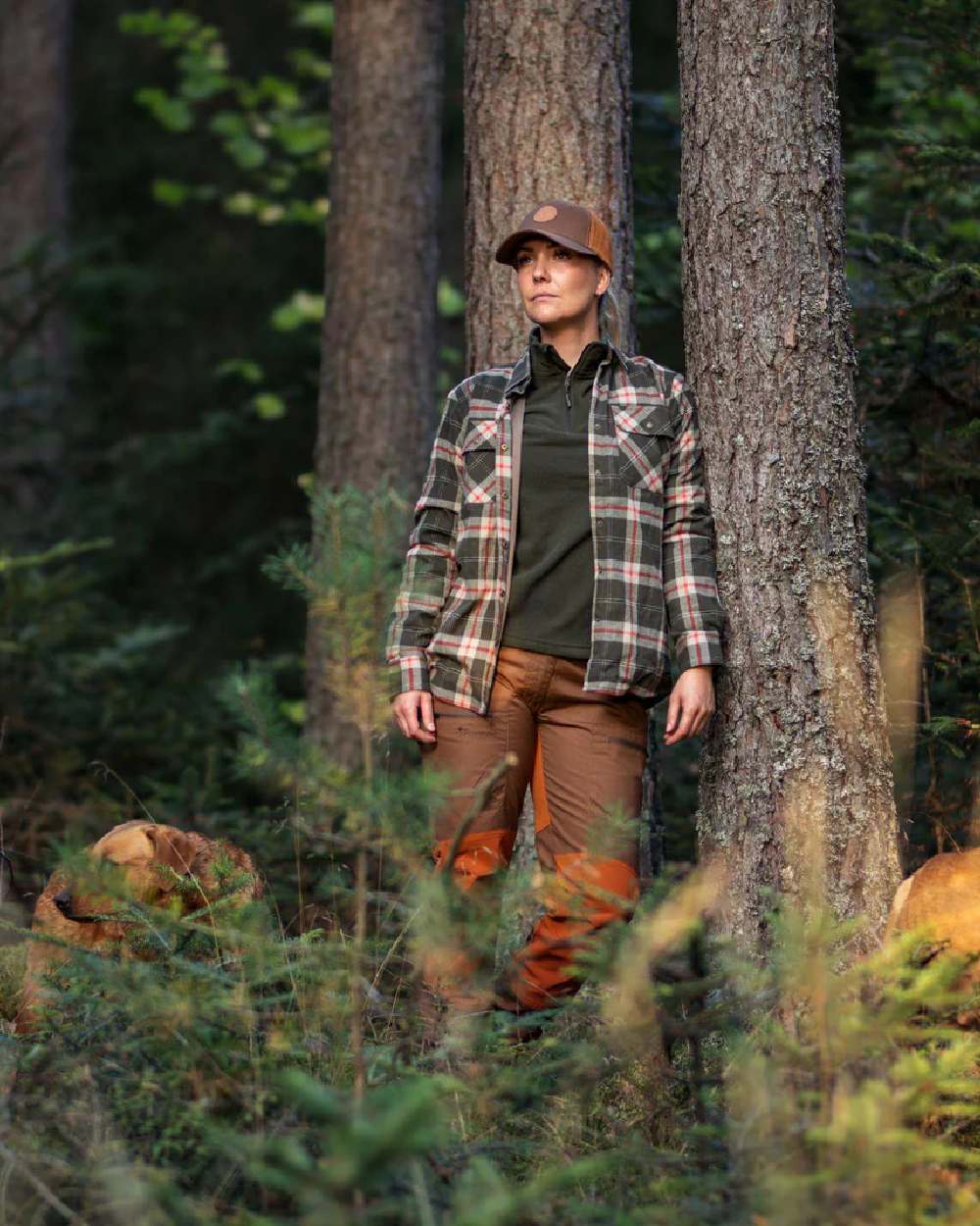 Green coloured Pinewood Womens Tiveden Fleece Sweater on forest background #colour_green