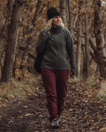Earth Plum Coloured Pinewood Womens Wilda Stretch Shell Trousers on outdoor background #colour_earth-plum