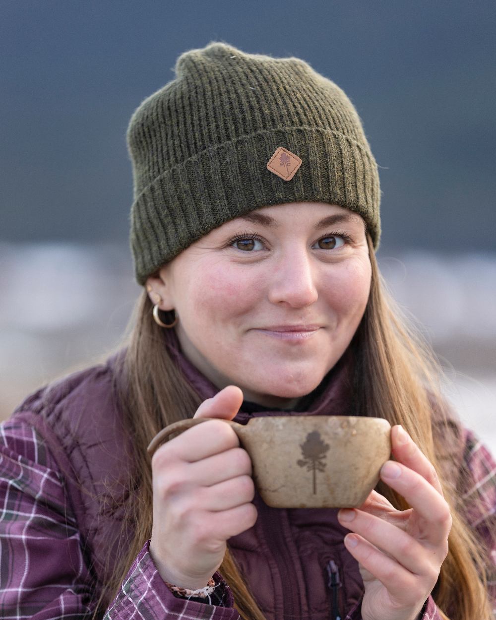 Mossgreen Mel Coloured Pinewood Wool Knitted Hat on outdoor background #colour_mossgreen-mel