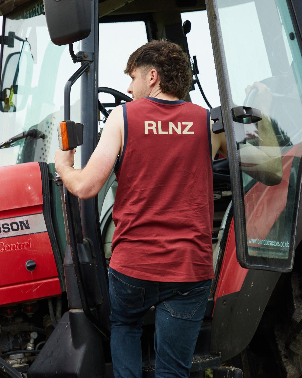 Rhubarb Multi coloured Ridgeline Backslider Singlet Top on haystack background #colour_rhubarb-multi