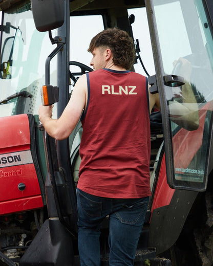 Rhubarb Multi coloured Ridgeline Backslider Singlet Top on haystack background #colour_rhubarb-multi