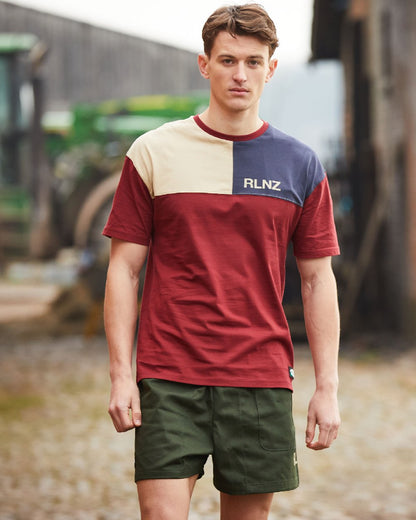 Rhubarb Multi coloured Ridgeline Backslider T-Shirt on outdoor background #colour_rhubarb-multi