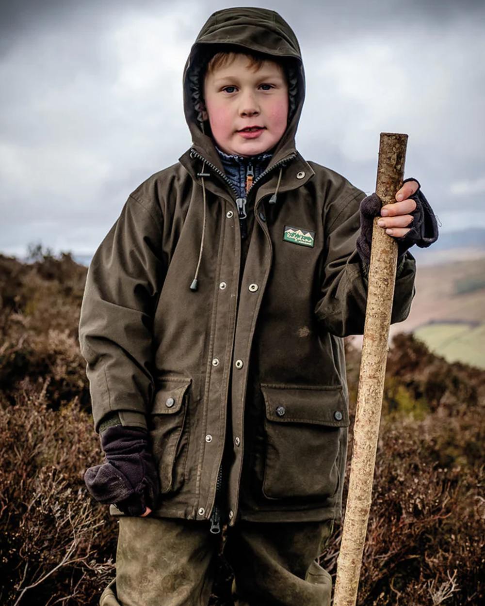 Deep Forest coloured Ridgeline Childrens Spiker Jacket on white background #colour_deep-forest