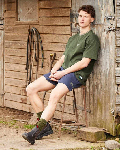 Olive coloured Ridgeline Hose Down T-Shirt on door background #colour_olive