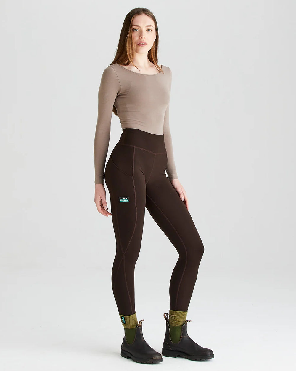 Deep Bark coloured Ridgeline Ladies Infinity Leggings on grey background #colour_deep-green