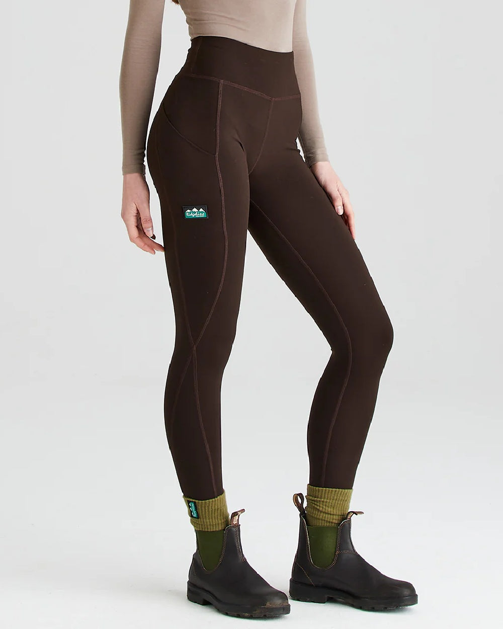 Deep Bark coloured Ridgeline Ladies Infinity Leggings on grey background #colour_deep-green