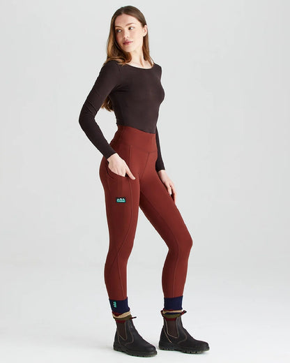 Oxblood coloured Ridgeline Ladies Infinity Leggings on grey background #colour_oxblood