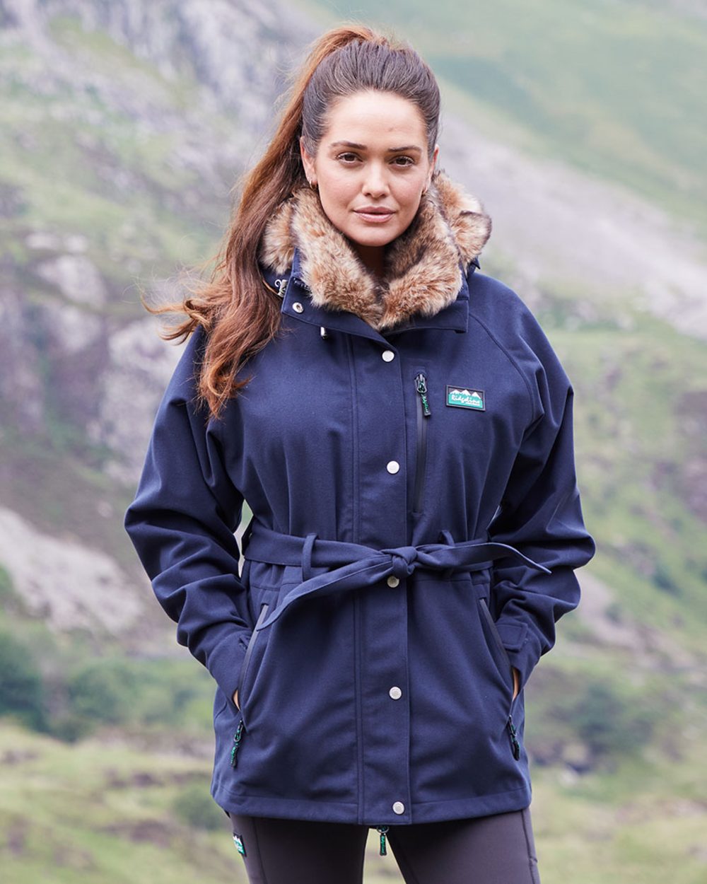 Navy coloured Ridgeline Ladies Monsoon Nordic Jacket on mountain background #colour_navy