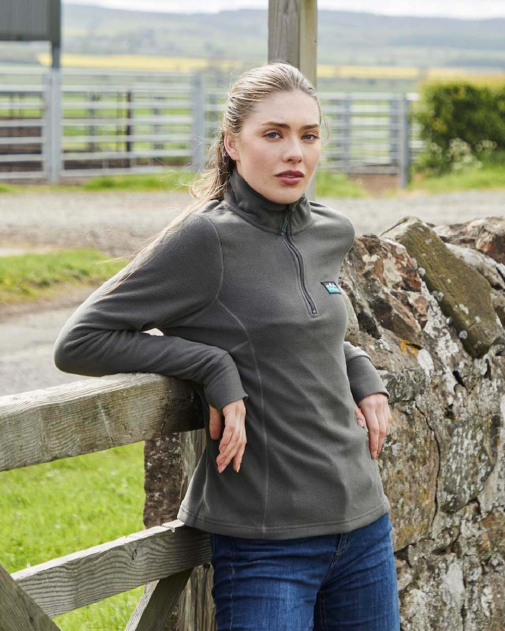 Moss coloured Ridgeline Ladies Narvik Fleece on farm background #colour_moss
